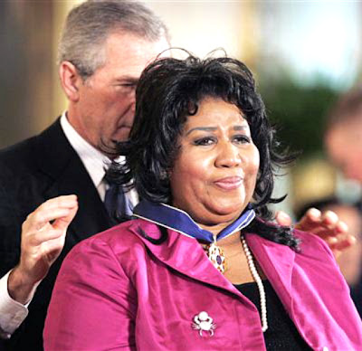 Aretha Franklin wipes a tear