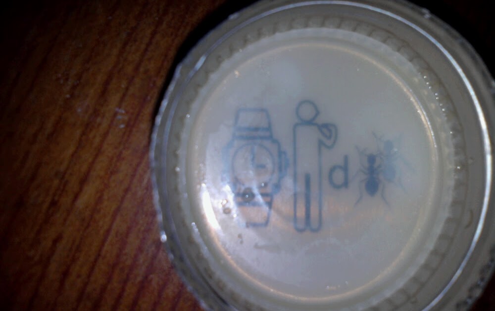 Mickey's Beer Cap Puzzle Answer Board: Mickeys Beer Cap Puzzle 49: Wristwatch + Figure Pointing