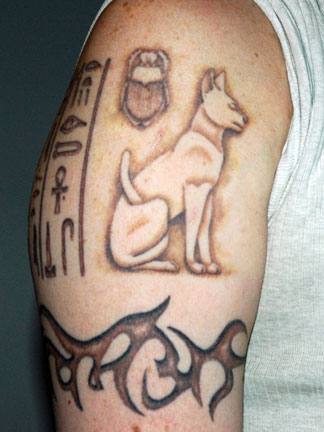 Egyptian cat tattoo on a big step to show your individuality,