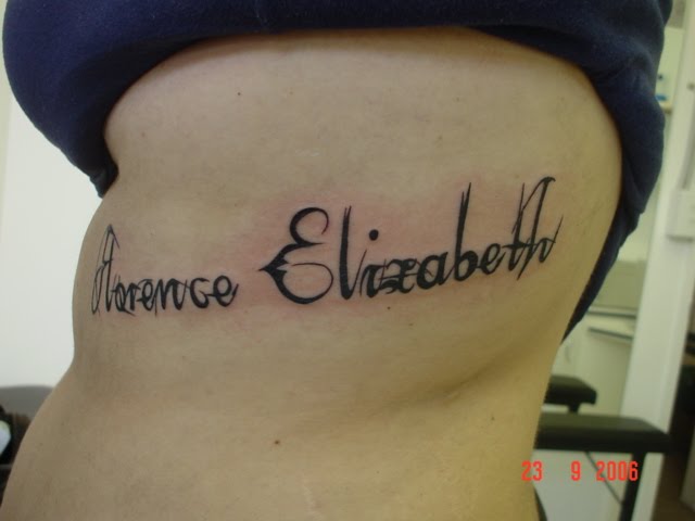 Women+tattoos+on+side