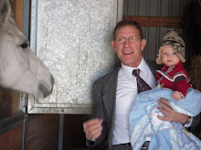 Helping Grandpa feed the horses.