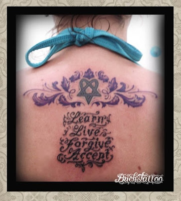 Woman Lower Back Tattoo Designs