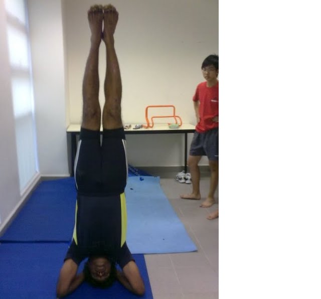 runningcoachsg: Head Stand - The King of Yoga