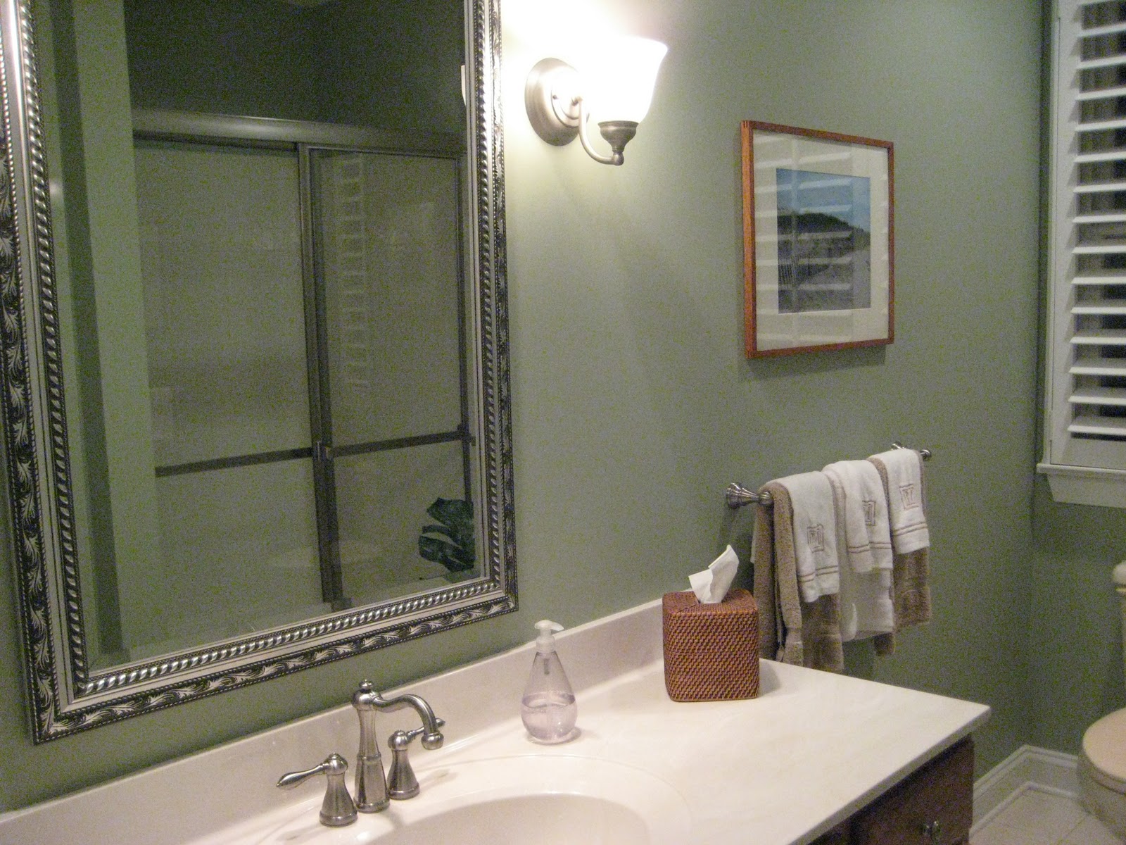 country bathroom fixtures replaced the huge wall size mirror with a framed one and I had the 