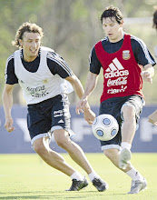 Messi-Heinze (L)