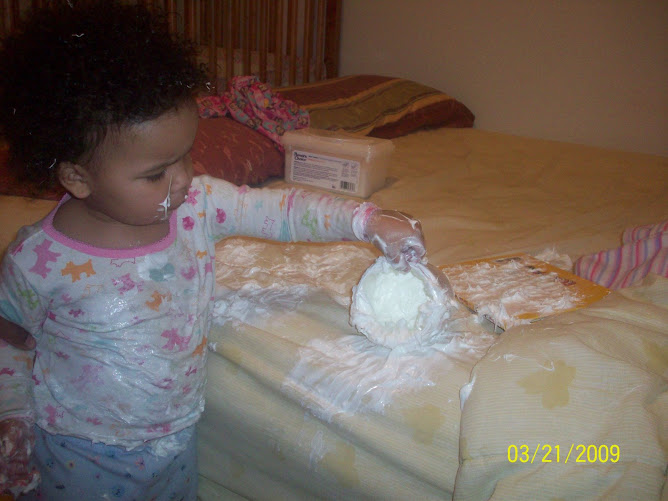 Leah trying to clean up her own mess,notice her bed and her fav book covered,which made her upset