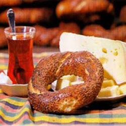 eat simit with turkish tea in tea glass as our traditional snack
