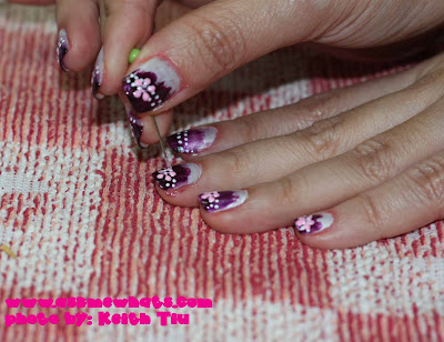 rhinestones on nails. Apply rhinestone in the middle
