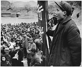 Mao Tse-Tung, leader of China's Communists, addresses some of his followers, 12/06/1944