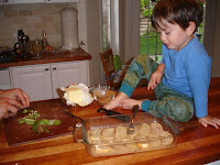 Ben helps prep fresh fruit garnish