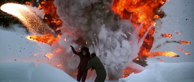 Pierce Brosnan escapes henchmen in a snow scene
