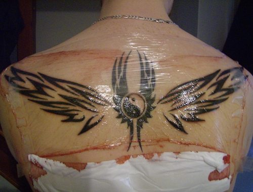 and in demand tattoo designs are the angel wings tattoos Both men