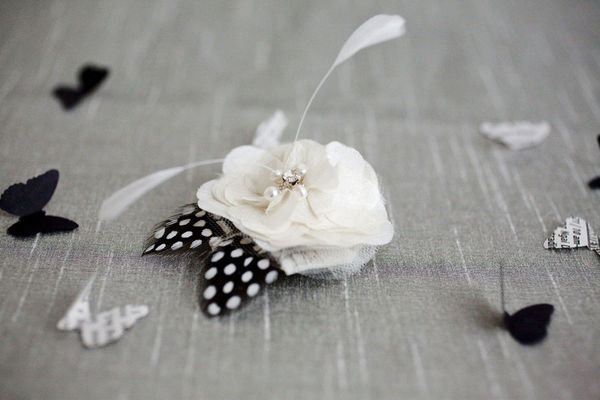 A gorgeous flower hair pin to match the floral theme of the wedding