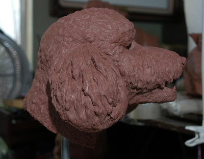 clay poodle head sculture