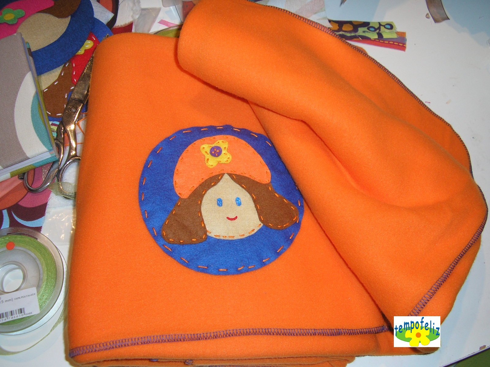 [Manta+com+boneca.JPG]