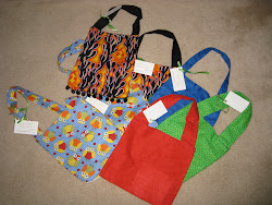 I made lots of bags yesterday.  My favorites of the day are the Owl material and the Flame material