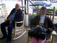 Customers sitting on the porch waiting for their pecans to be cracked.