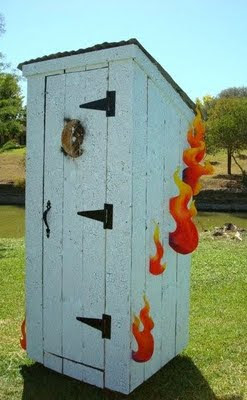flames painted on outhouse