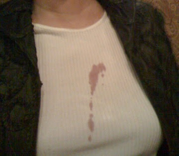 wine stain dribbled down front of my shirt