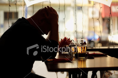 [ist2_1607217-sad-man-sitting-in-restaurant.jpg]