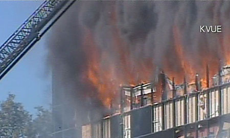 [a-small-private-plane-crashes-in-to-a-building-in-texas-pic-ap-144585338.jpg]