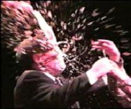 Bill Kristol getting hit with a pie