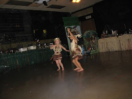 Phoenix and Gabrielle dancing Hula