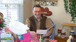 Kay opening his card from Todd