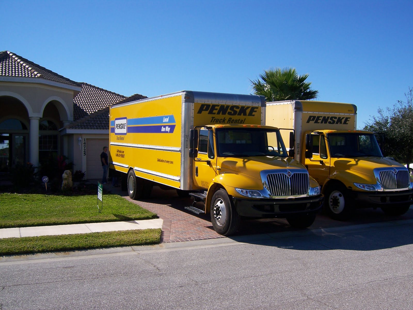 [moving-two+trucks.JPG]