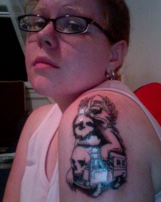 Sweeet! so sarahsloth finally has a sloth tattoo. It's not my art tho.
