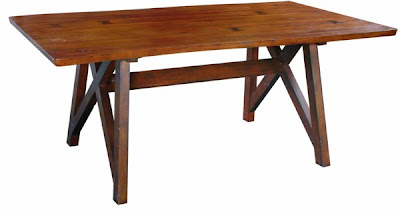 Turning House Furniture makes tables from wood reclaimed from old buildings. It exhibited at the High Point Market. It is based in Bassett, Va.