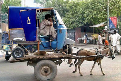 rikshaw+khota+and+cell+phone.jpg