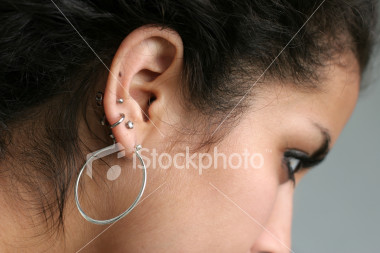 [ist2_1008927-ear-piercing.jpg]