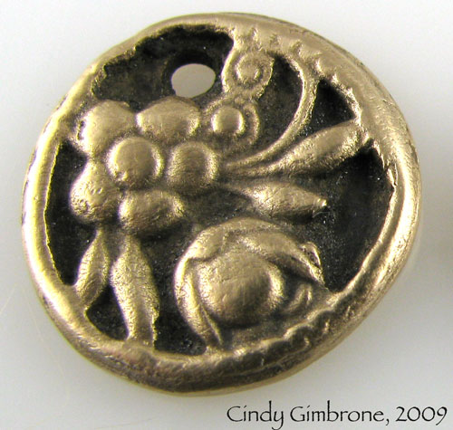 [BronzeFlwrCharmWeb.jpg]