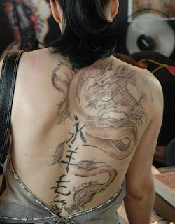 lower back tattoos in beautifull female