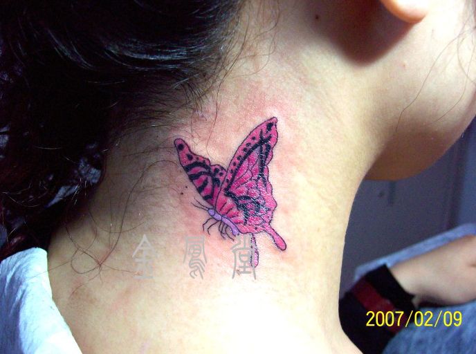 butterfly tattoos on back of neck. Neck Tattoos, flowers neck tattoo, Butterfly. neck tattoos