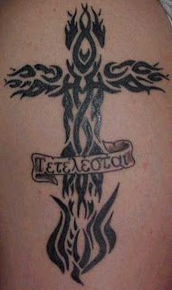 tribal tatatoos cross on arm