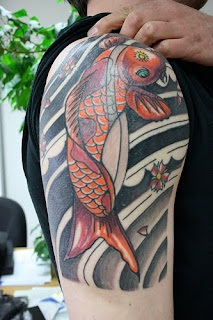 fish tattoos on arm design ideas
