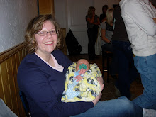 Michelle holds one of the twins