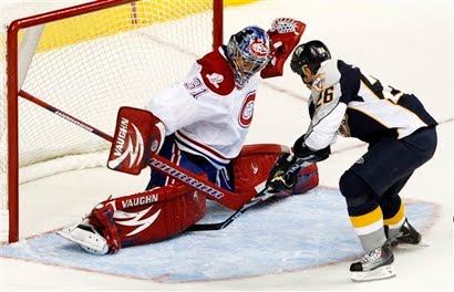 [capt.140a010fd2a3447cbe76dfebf7c4a180.canadiens_predators_hockey_tnmh114.jpg]
