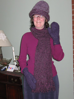 Katharine wearing her purple hat, mittens and scarf that I made for her