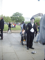 "Charlie Chaplin " impersonator posing along the river Thames embarkment.(Sunday 30-5-2010)