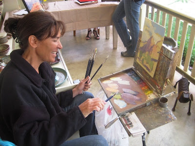 Artist Kate Starling does an oil painting demonstration for visitors at Worthington Gallery during the 2009 open studio and gallery tour in Zion Canyon