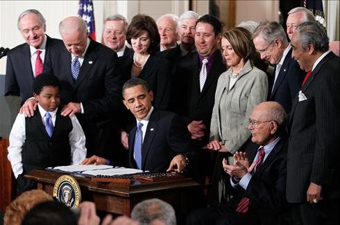 [obama+signs+health+care+bill.jpg]