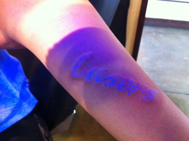 So she got a Lasers UV tattoo that only "shines" under blacklight. So she got a Lasers UV tattoo that only "shines" under blacklight.