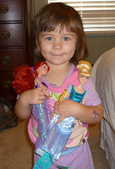Rylan and her Barbies