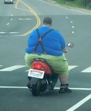 fat_man_on_scooter.jpg