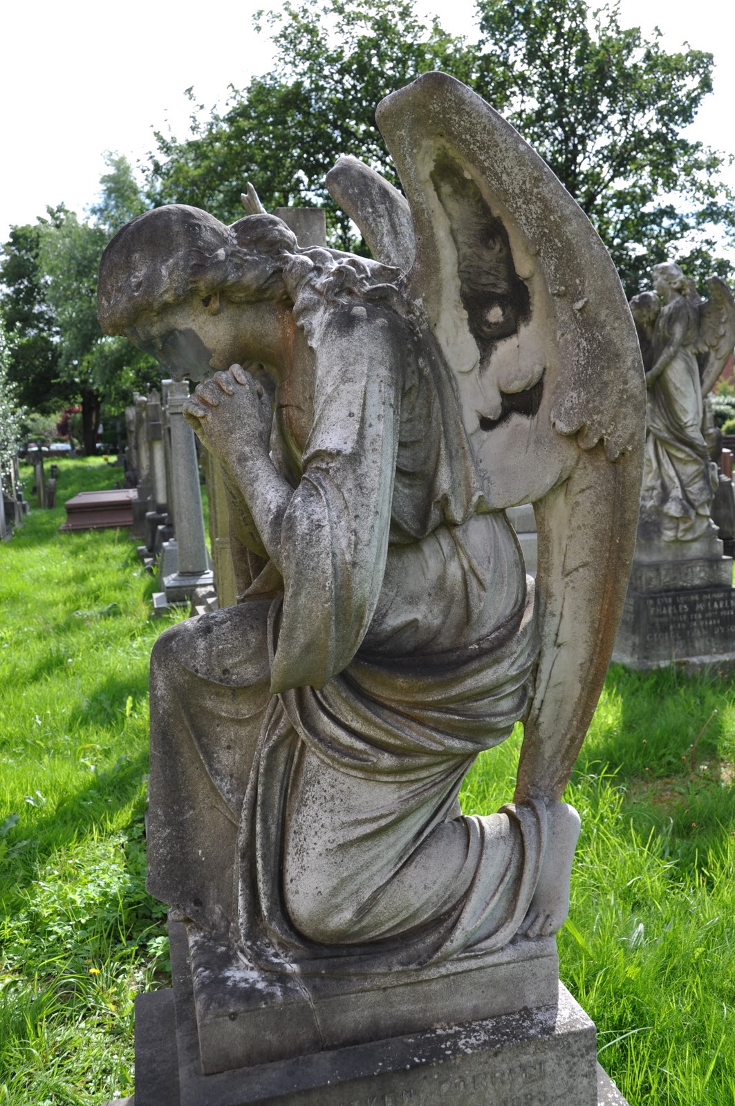 The Graveyard Detective Mourning Statues