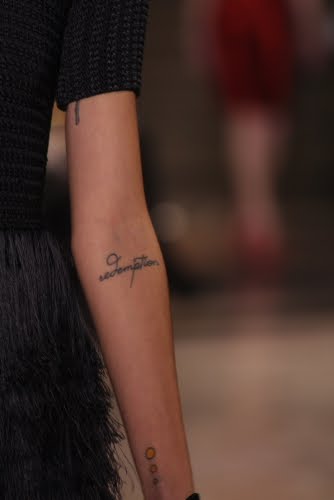 The Brazilian model shows off her inner arm tattoo with pride Freja Beha