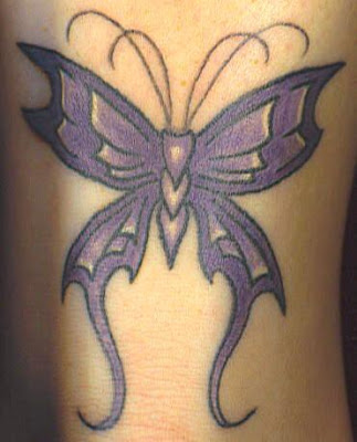 Purple butterfly tattoo image. tattoowindow.com 12/07/2010 11:51:15 PM GMT
